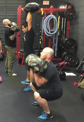 ultimate sandbag squats