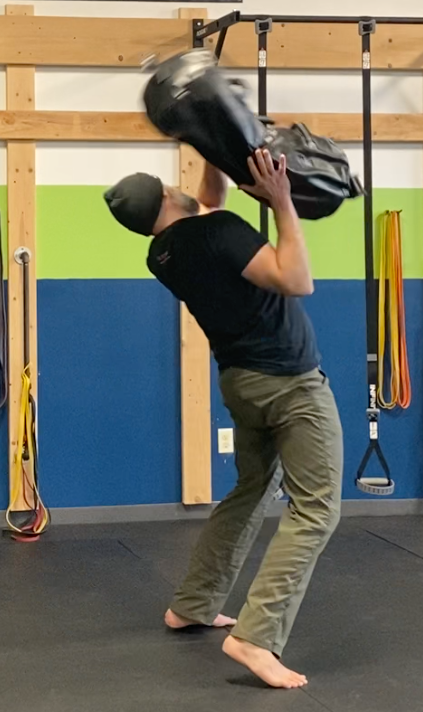 sandbag over shoulder toss