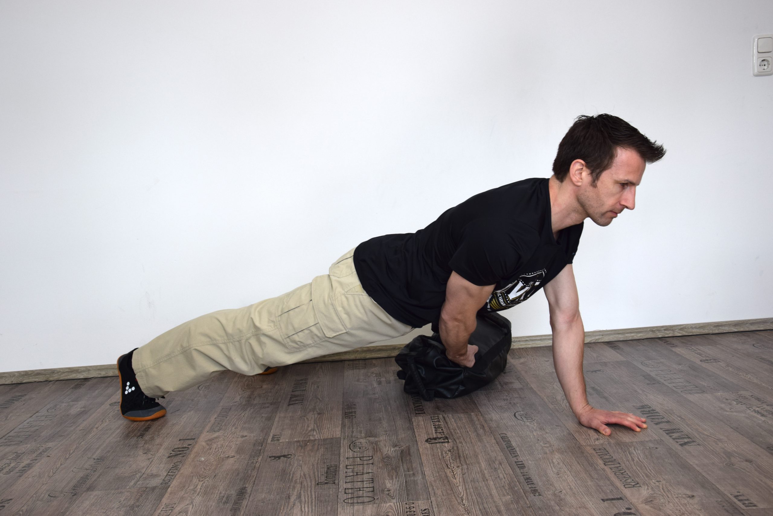 sandbag plank drag
