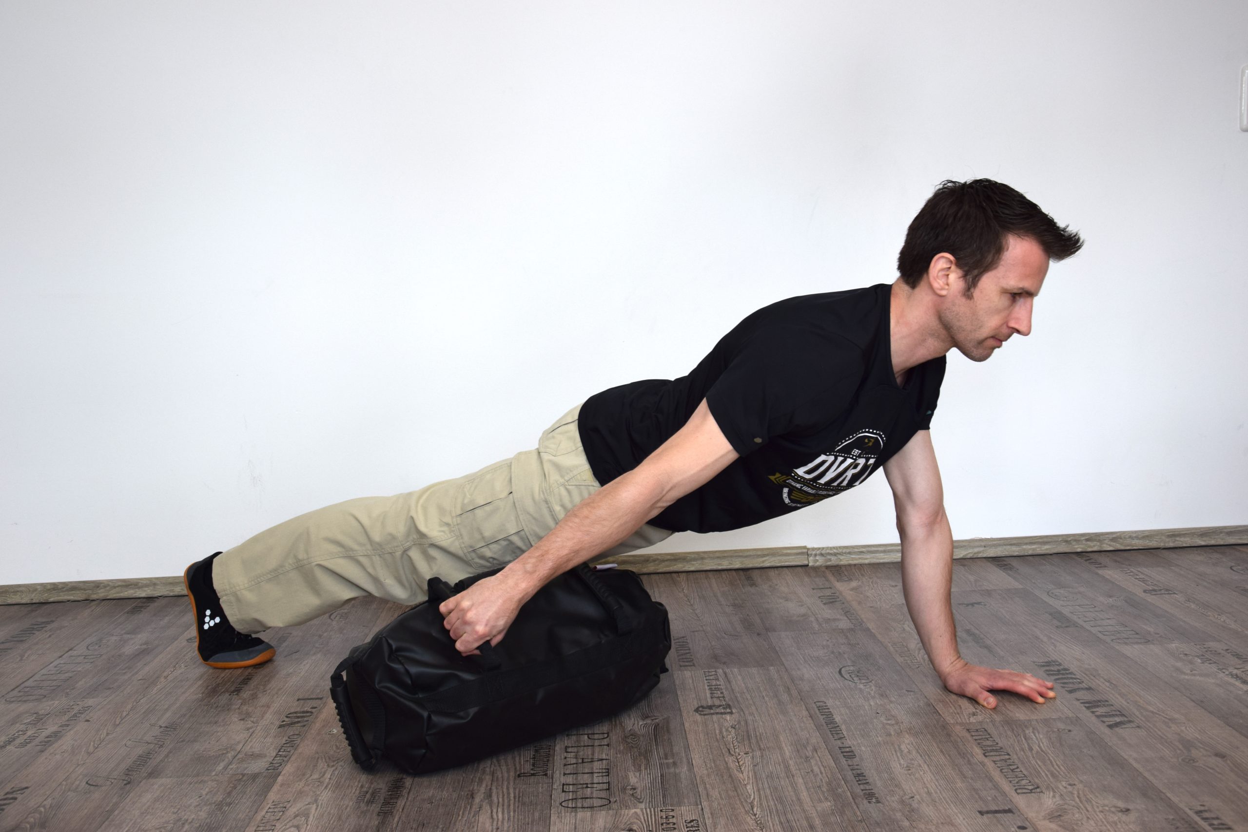 sandbag plank drag