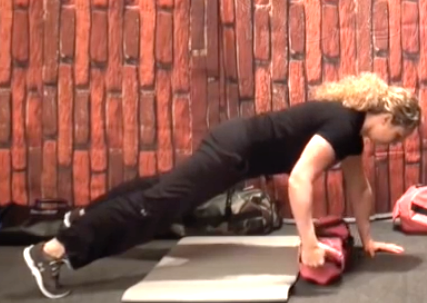 plank sandbag drag