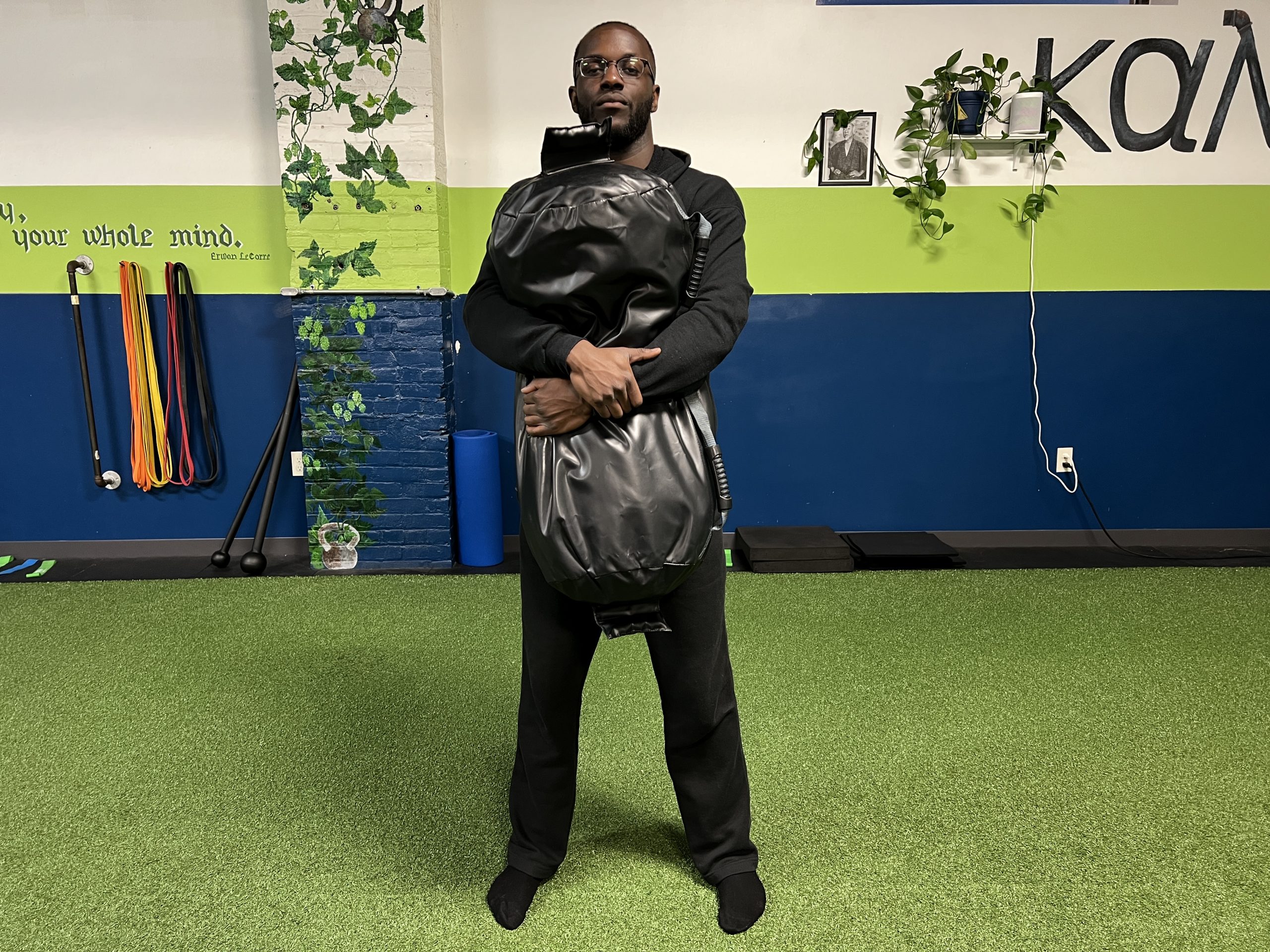 sandbag bear hug squat